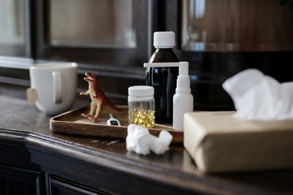 Croatian family at home preparing tea and tissues during cold season, no faces visible
