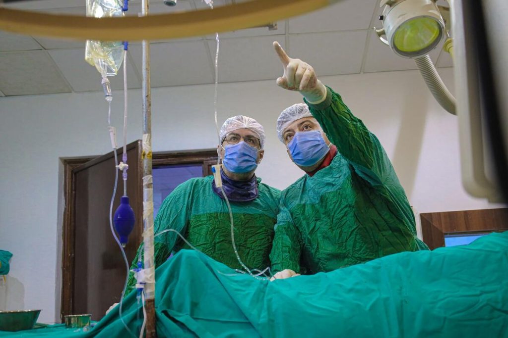 pediatric cardiac catheterization lab with monitors, no people