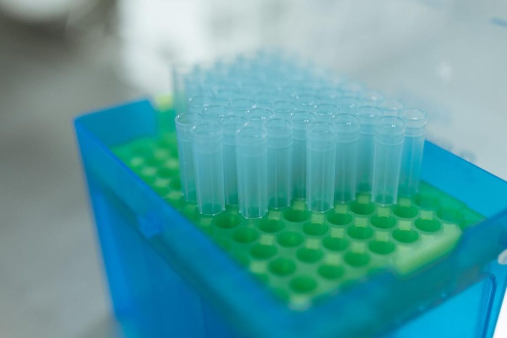 close-up of ostomy barrier paste tube on a pharmacy shelf, no people