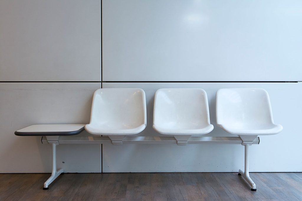 empty winter clinic waiting room with chairs, no people