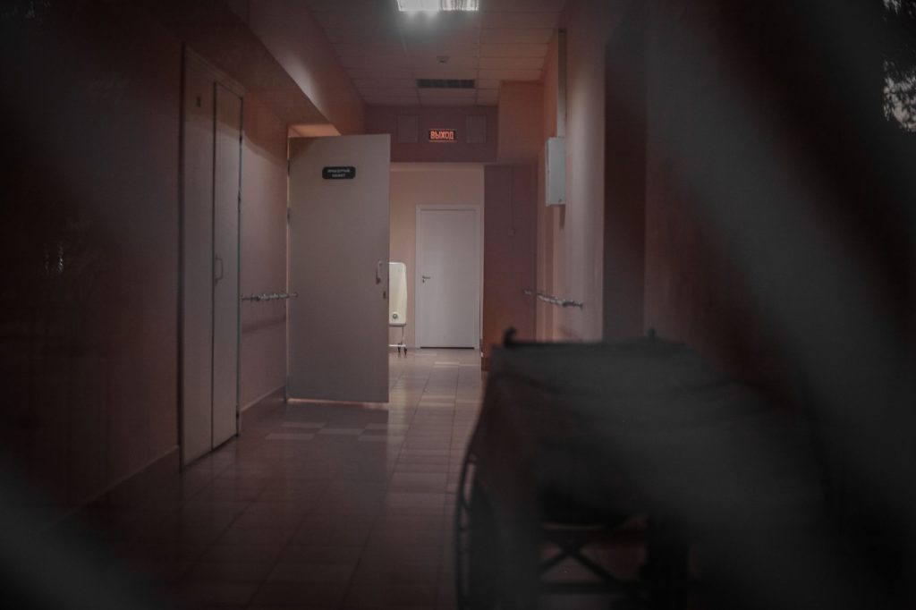 hospital emergency department corridor, empty, no people visible