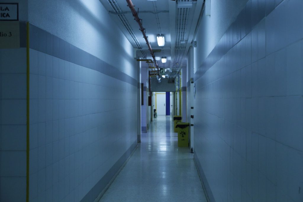 calm empty hospital corridor with natural light, no people