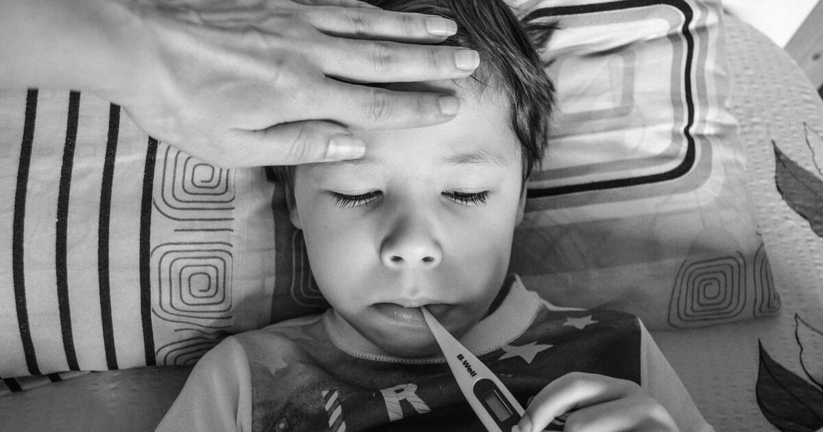 sick child thermometer parent bedroom care
